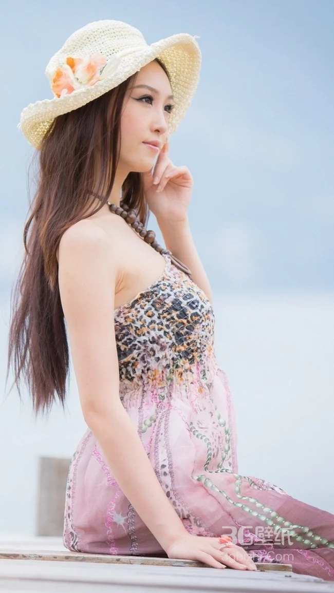 头戴草帽的治愈系美女手机壁纸1