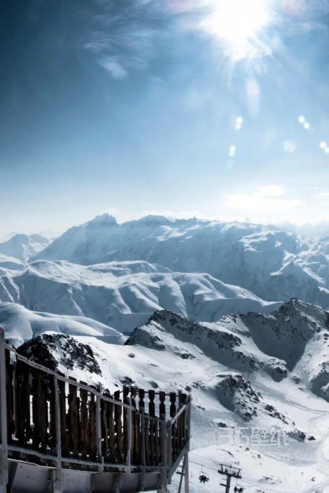 阳光下的雪山手机壁纸下载1