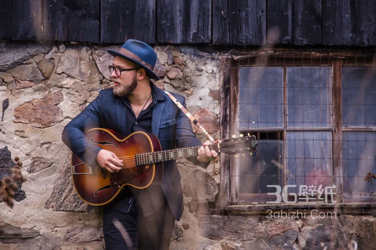 型男与吉他的高清素材图片3