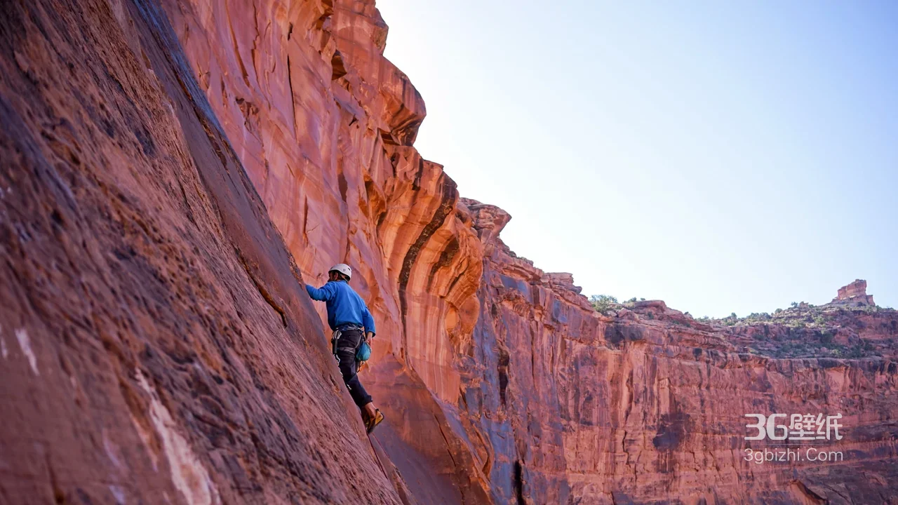攀岩者·峭壁挑战 写实风红色岩壁户外冒险电脑壁纸1