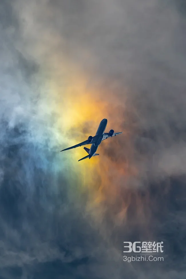 飞机穿梭彩色云海·唯美梦幻风 天空主题壁纸1