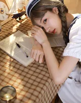 学习文具很丰富的双麻花辫学生制服美少女私房写真