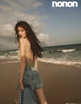 徐璐牛仔热裤穿搭享受夏日海风唯美海边写真图片